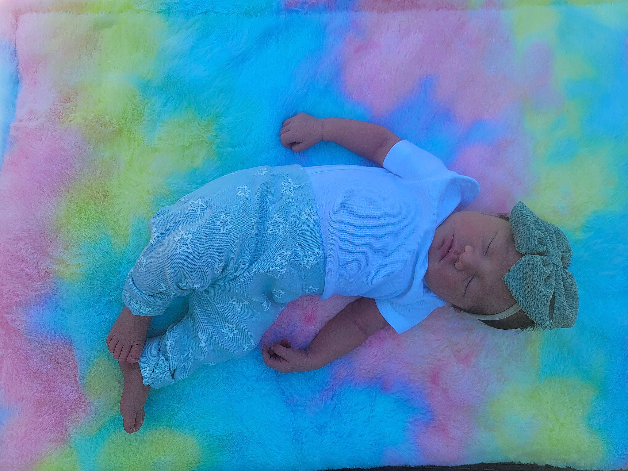 Amelia is registered to the contest to win money with this photo: aqua, art, azure, child, electric_blue, entertainment, fun, grass, happy, hat, headwear, leisure, linens, magenta, paint, person, pink, plant, sky, sun_hat
