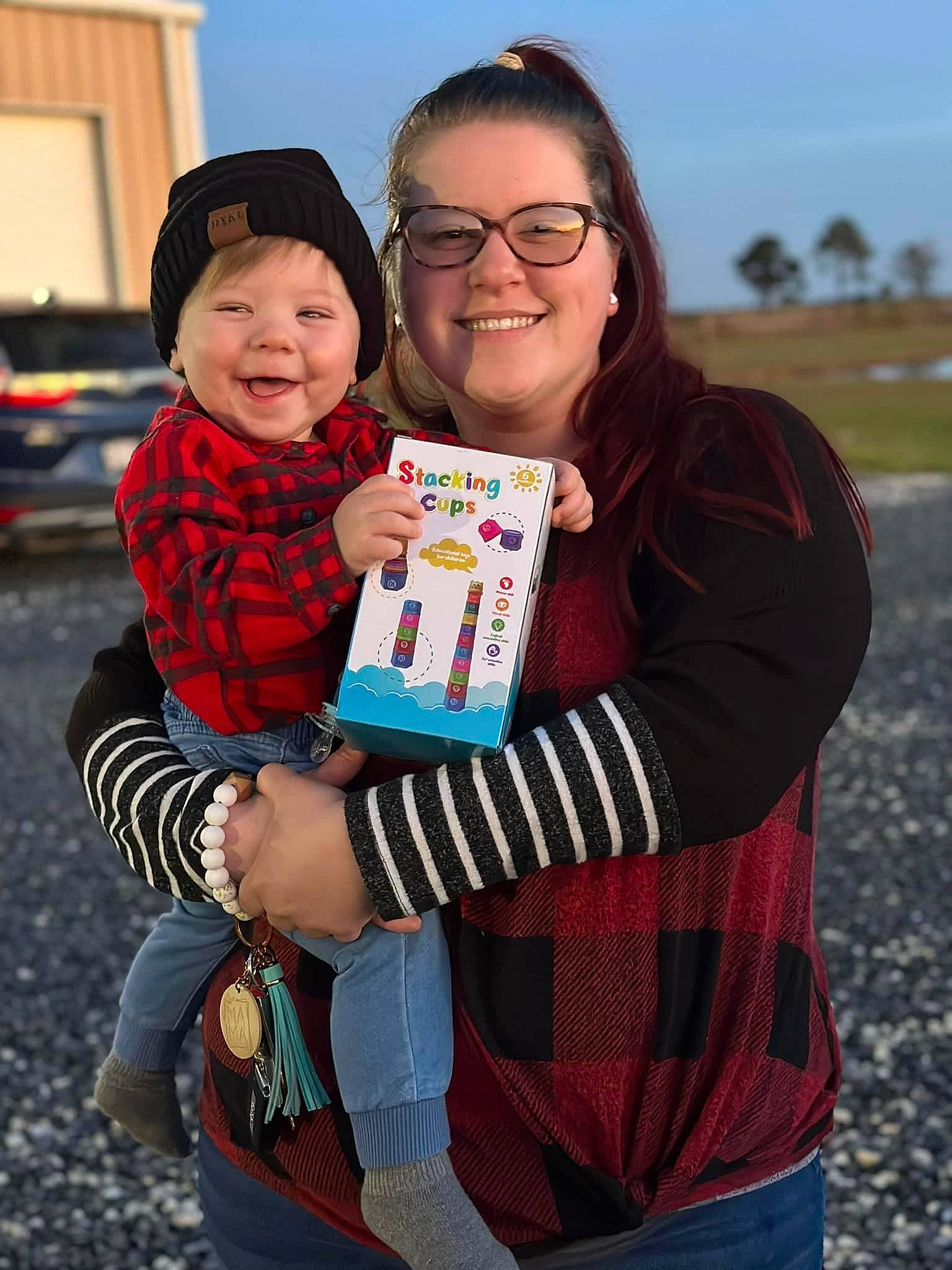 Joseph is registered to the contest to win money with this photo: child, event, face, fun, grass, happy, hat, headwear, jewellery, joy, leisure, pattern, person, plaid, recreation, sitting, sky, sleeve, smile, t_shirt