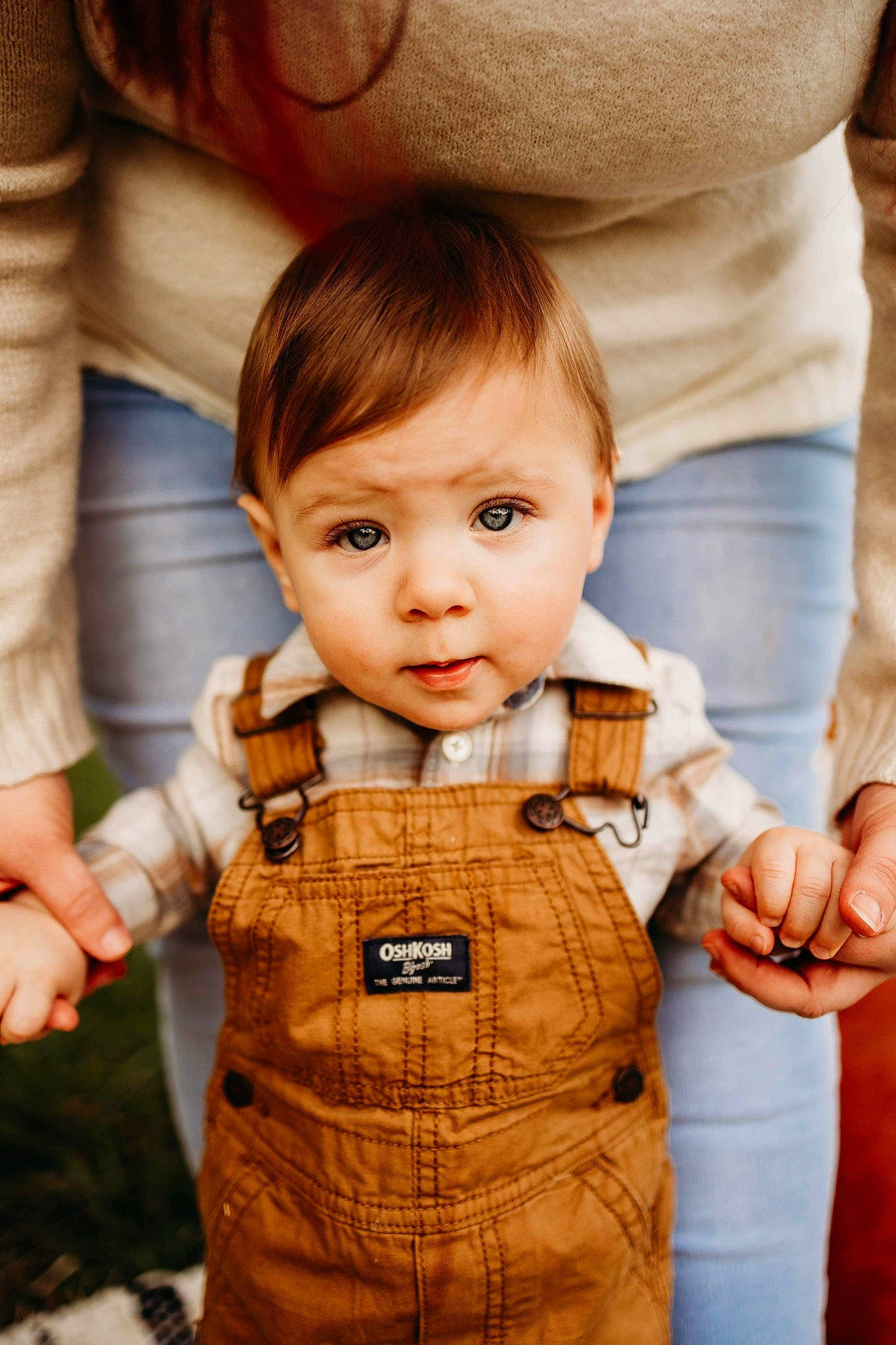Joseph is registered to the contest to win money with this photo: baby, baby_toddler_clothing, cheek, child, collar, face, facial_expression, finger, gesture, hairstyle, hand, happy, head, human_body, joint, nose, person, skin, sleeve, thumb