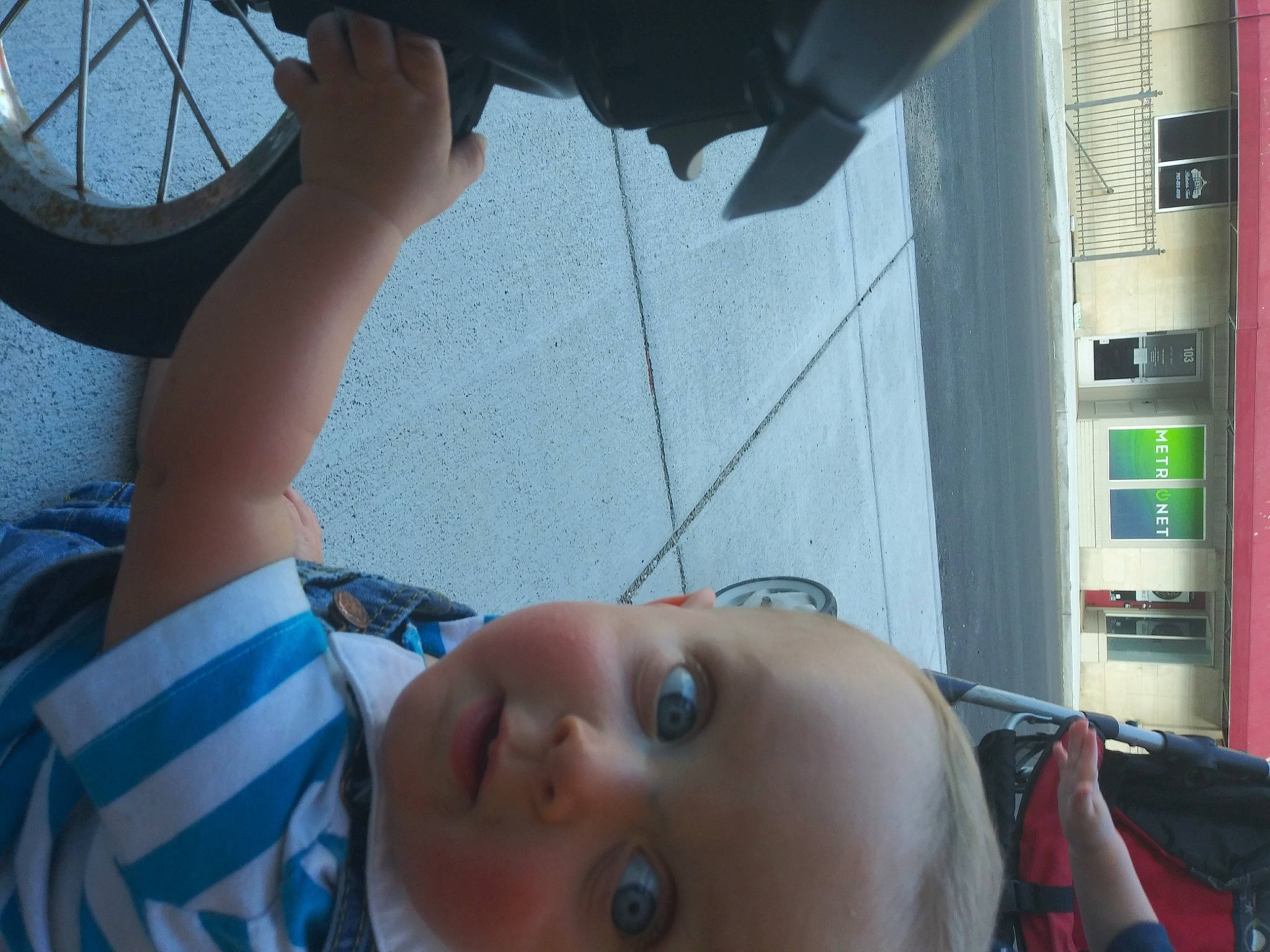 Markus is registered to the contest to win money with this photo: baby, black_hair, cheek, child, chin, ear, eye, fun, head, leg, mouth, neck, nose, person, skin, smile, toddler, vacation