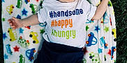 Waylon is registered to the contest to win money with this photo: baby, sleeping, blanket, colorful, cars, stars, tshirt, text, cute, infant, outdoor, grass, peaceful, child, happy, handsome, hungry, clothing, foot, portrait