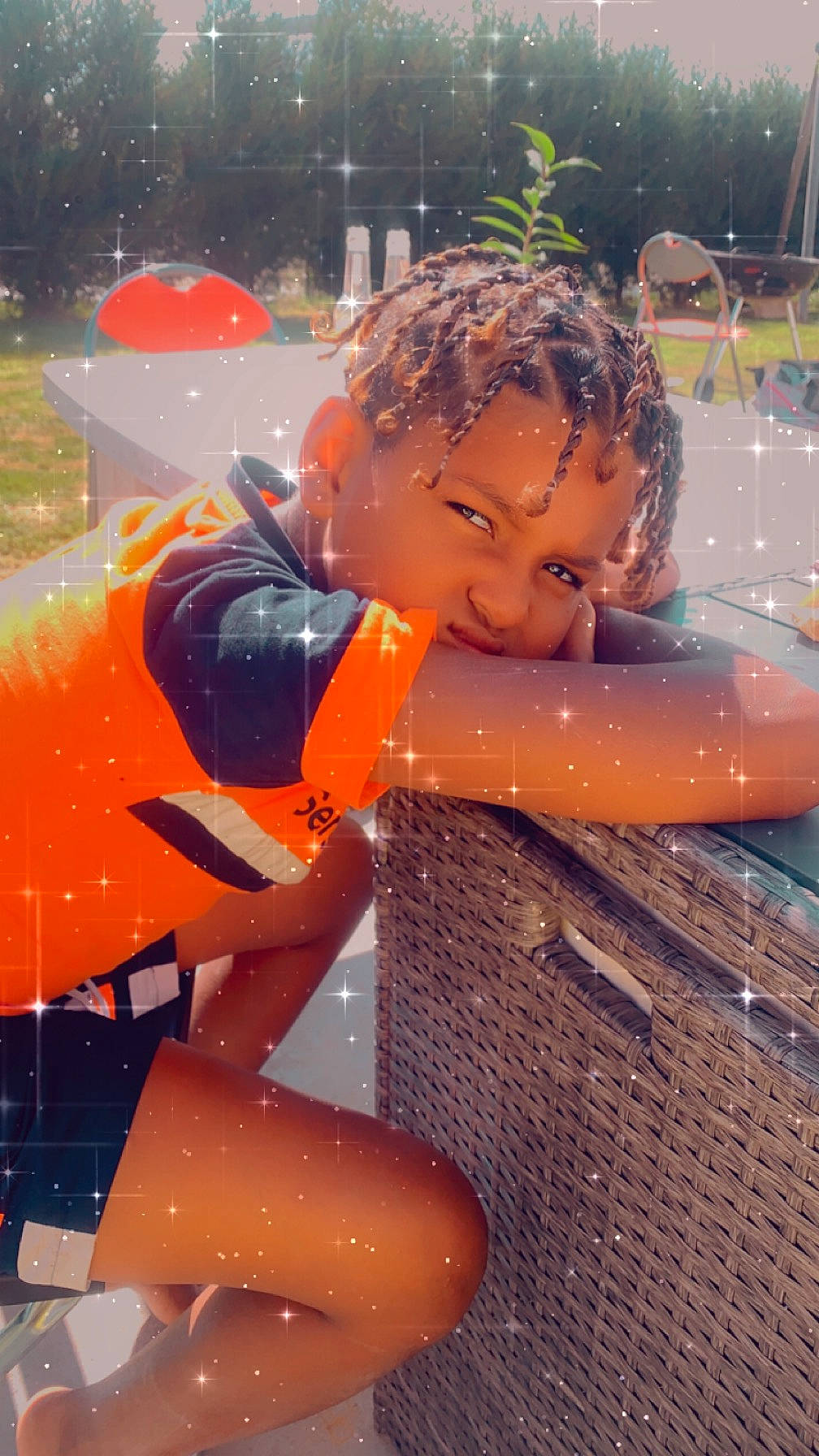 Djibril participe au concours pour gagner de l'argent avec cette photo : bathing, black_hair, child, fun, happy, leisure, person, play, recreation, reflection, sitting, toddler, vacation, water, water_park