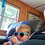 Raelynn joined the competition — help win amazing prizes! toddler, child, sunglasses, indoor, couch, leather, window, wood_paneling, hand, motion_blur, person, tattoo, mirror, casual, light, daylight, colorful, relaxed, home, portrait