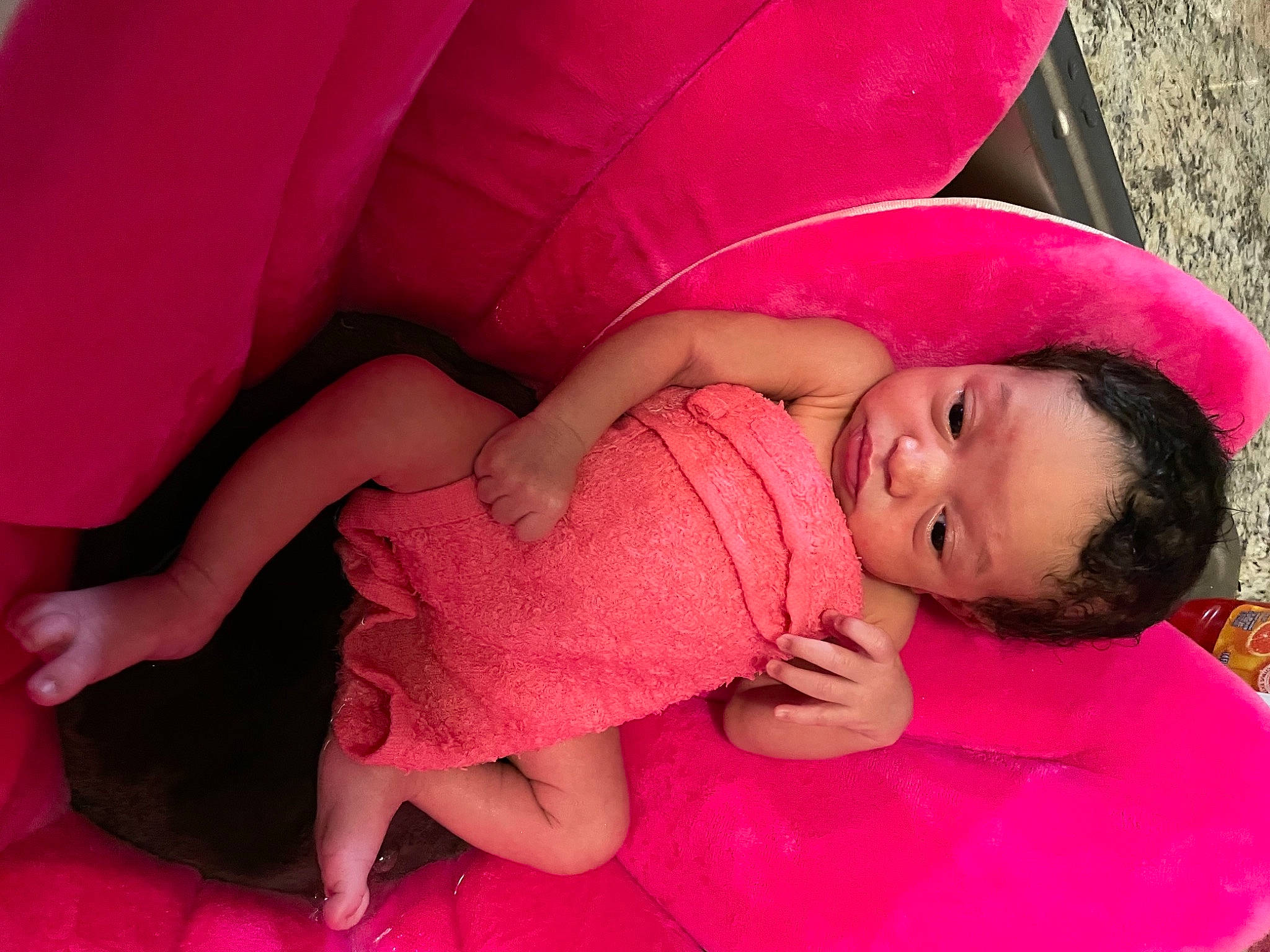 Azariyah is registered to the contest to win money with this photo: baby, baby_toddler_clothing, barefoot, cheek, child, comfort, flesh, foot, lip, magenta, person, pink, skin, toe