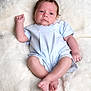 Vinnie-Jay joined the competition — help win amazing prizes! baby, infant, child, blue_outfit, checkered, lying_down, fluffy_blanket, white_background, cute, portrait, small_hands, small_feet, relaxed, indoors, soft_texture, skin, person, newborn, resting, peaceful