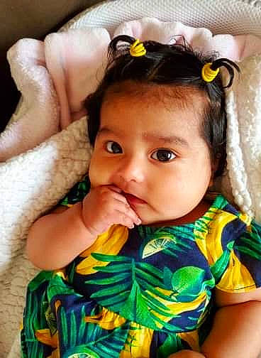 Valentina is registered to the contest to win money with this photo: baby, beauty, cheek, child, child_model, ear, fashion_accessory, fun, hair_accessory, hand, happy, lip, mouth, neck, nose, person, play, skin, smile, toddler