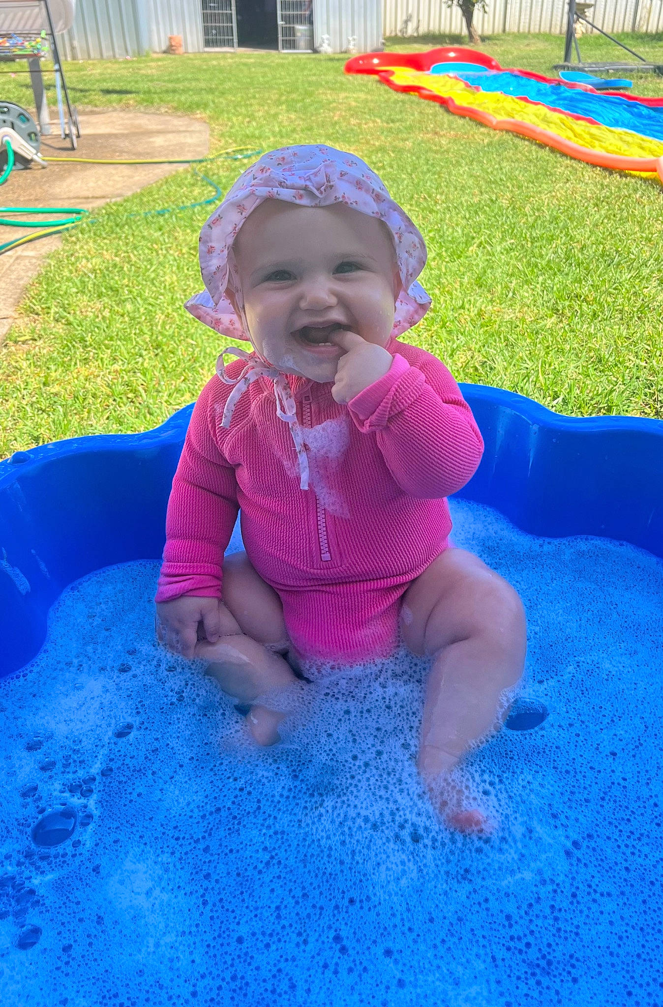 Ariella joined the competition — help win amazing prizes! baby, baby_toddler_clothing, child, city, electric_blue, fun, grass, green, happy, headwear, joy, leisure, magenta, outdoor_play_equipment, people_in_nature, person, play, playground, purple, recreation