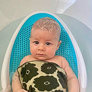 Fenn joined the competition — help win amazing prizes! baby, bath, blue_bath_seat, child, cloth, cute, eyes, face, floral_pattern, hand, indoors, infant, person, portrait, relaxing, sitting, skin, small, tub, water