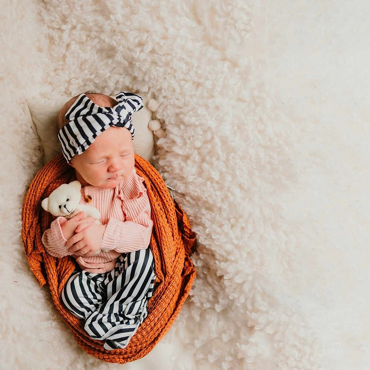 Mara is registered to the contest to win money with this photo: animal, baby, blanket, canine, clothing, face, hat, head, infantbed, newborn, people, person, pet, photography, sleeping, symbol, teddybear, toy, yawning