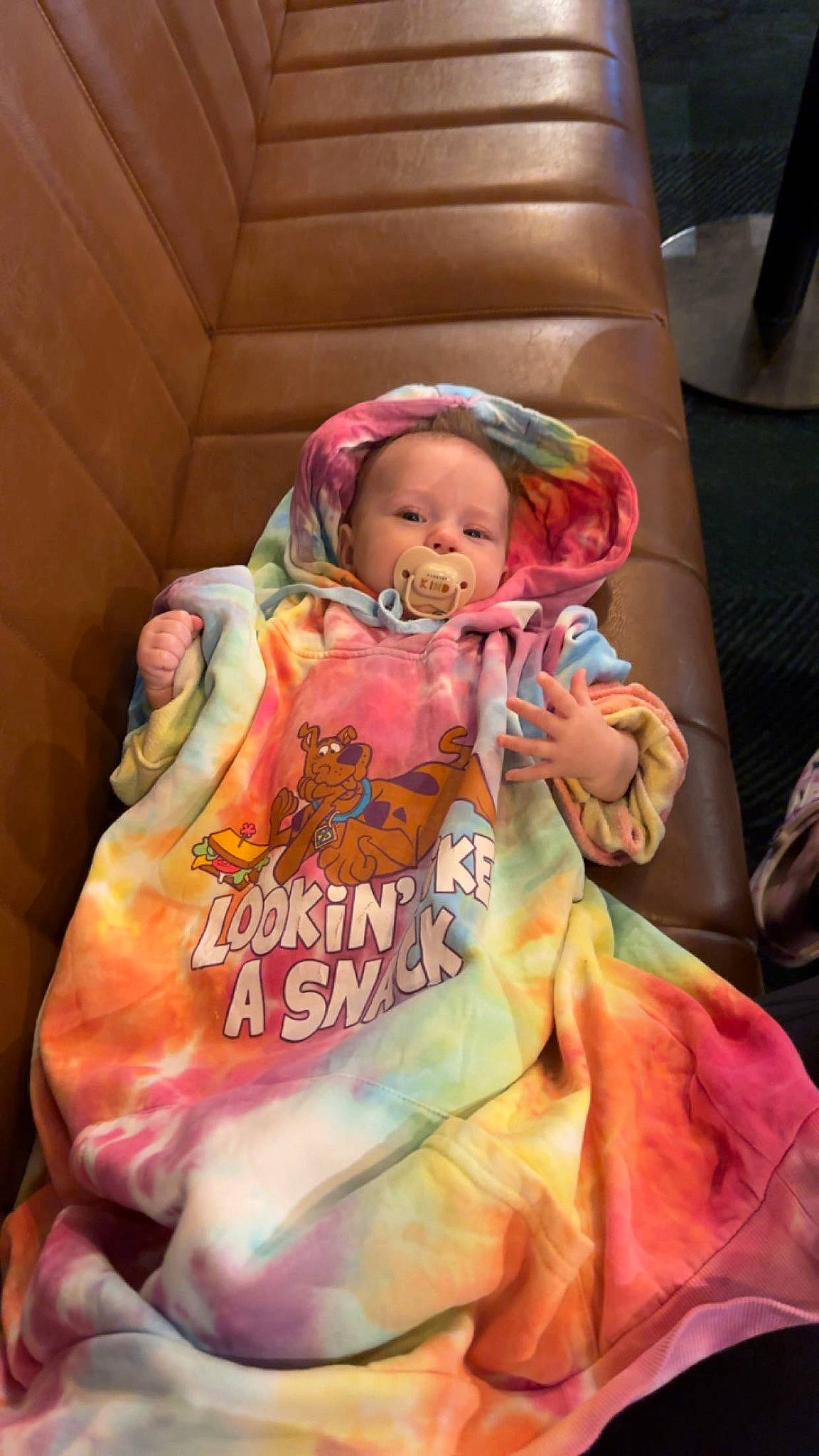 Aria is registered to the contest to win money with this photo: baby, baby_carriage, baby_products, baby_toddler_clothing, car_seat, cheek, child, comfort, costume, event, fun, head, linens, magenta, peach, person, personal_protective_equipment, pink, room, sitting