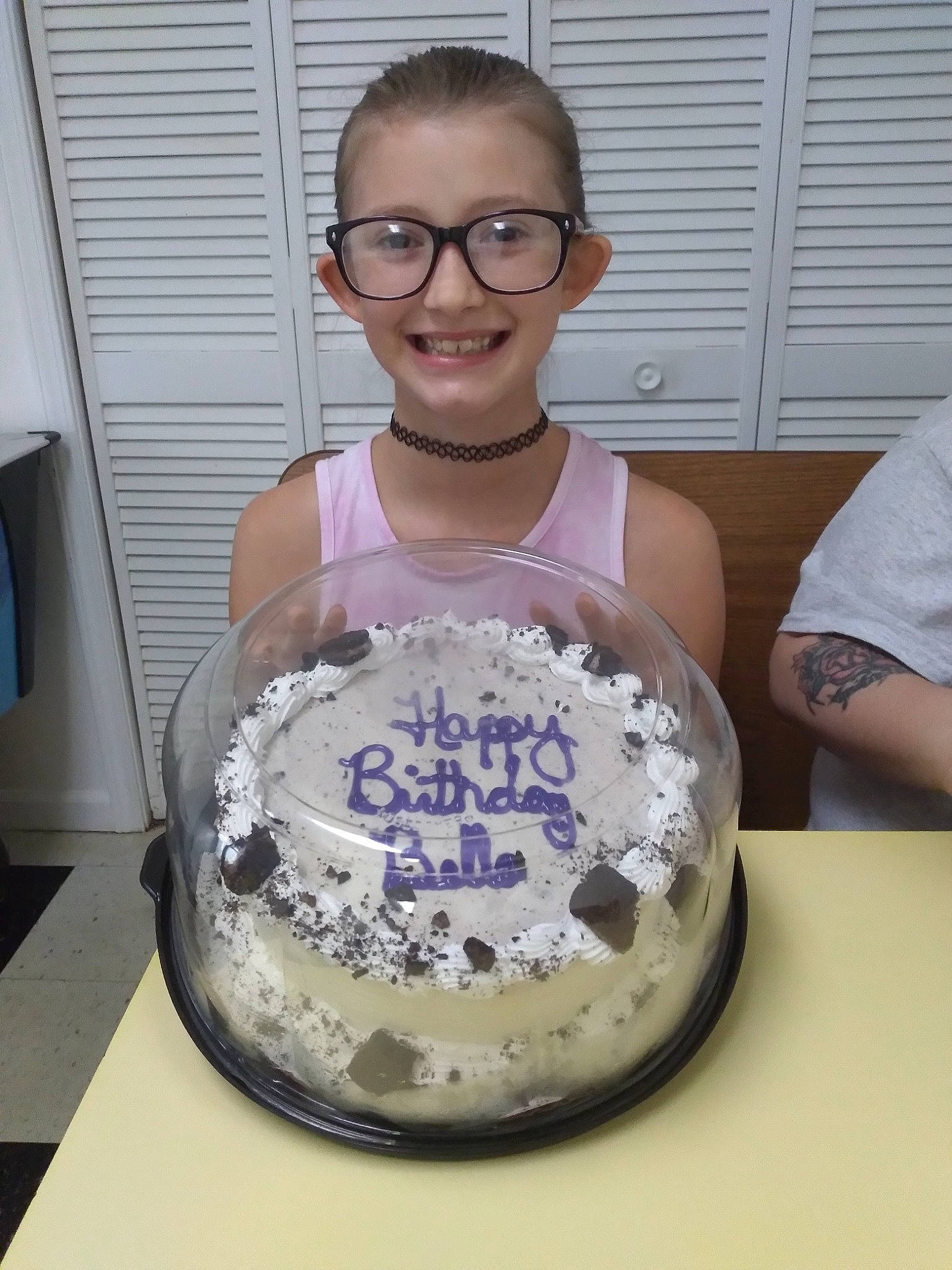 Isabella is registered to the contest to win money with this photo: baked_goods, birthday, birthday_cake, cake, cake_decorating, cake_decorating_supply, cooking, cream, cuisine, dish, dishware, food, glasses, ingredient, joy, person, plate, serveware, smile, sugar_cake