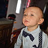 Kohen is registered to the contest to win money with this photo: background_blur, blue_shirt, bow_tie, boy, child, closeup, clothing, curious, cute, expression, eyes, face, fashion, home, indoor, person, portrait, suspenders, toddler, young_child
