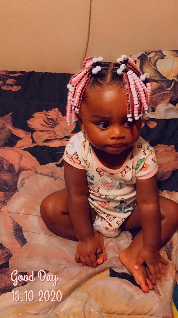Marleena Morgan is registered to the contest to win money with this photo: baby, baby_toddler_clothing, cheek, child, chin, dress, event, face, fashion_accessory, flash_photography, hairstyle, happy, headband, jewellery, peach, person, pink, sitting, skin, sleeve