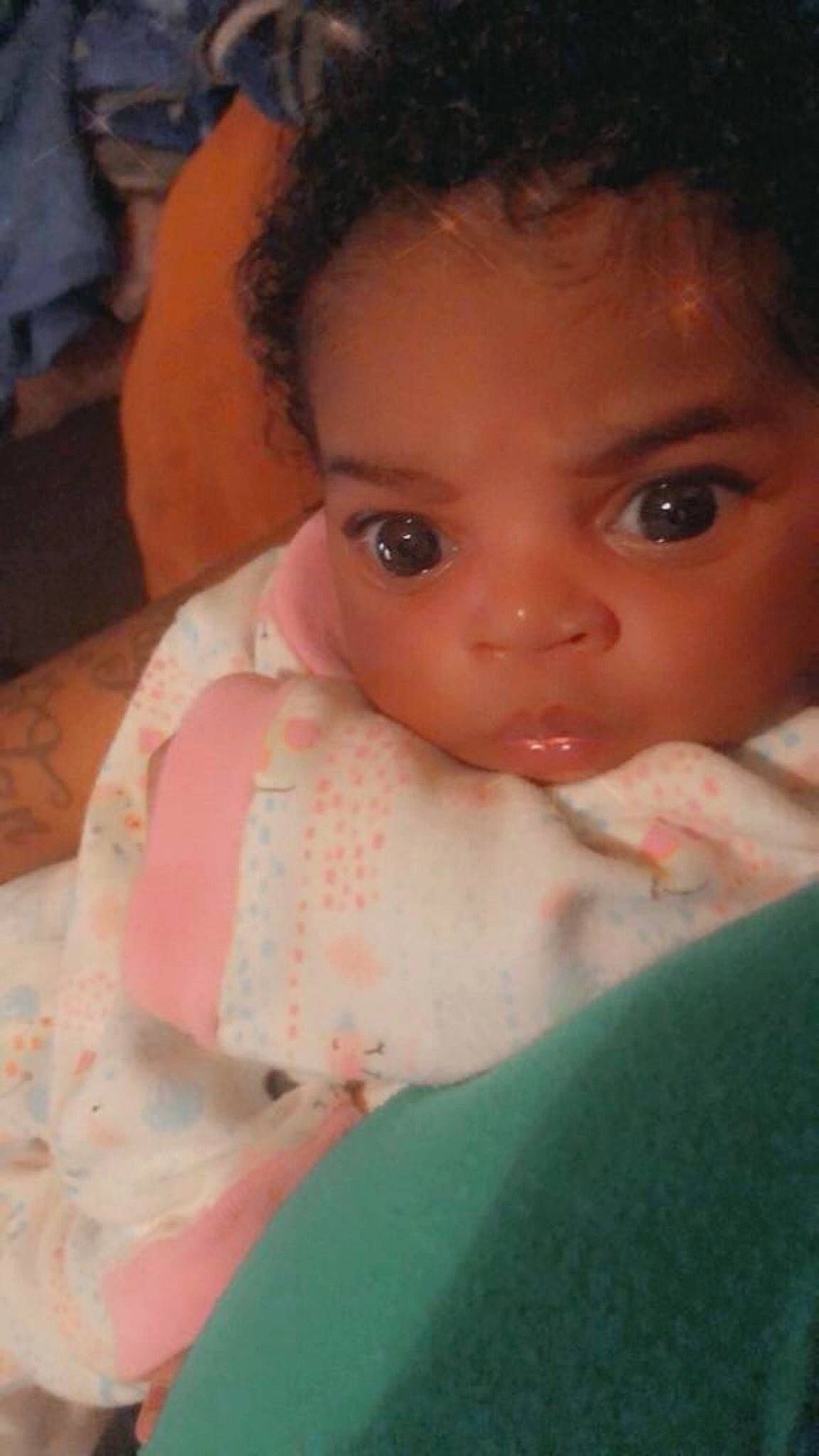 Marleena Morgan is registered to the contest to win money with this photo: baby, baby_toddler_clothing, cheek, child, chin, dress, eye, eyelash, forehead, fun, human_body, iris, linens, lip, nose, peach, person, pink, skin, smile