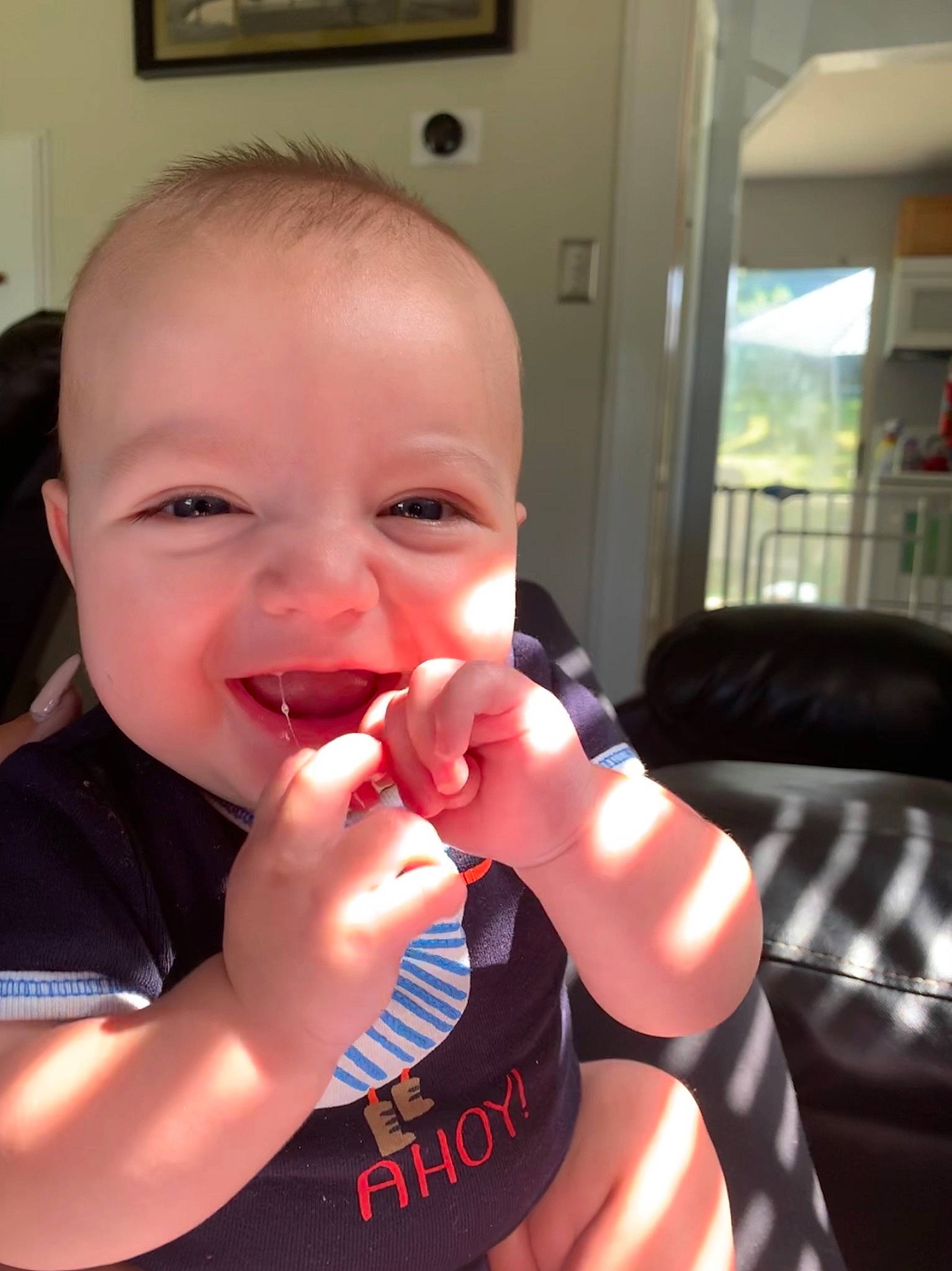 Haiden is registered to the contest to win money with this photo: baby, cheek, child, eating, finger, gesture, hand, joy, lip, mouth, muscle, nail, nose, person, skin, smile, thumb, toddler, tongue, tooth