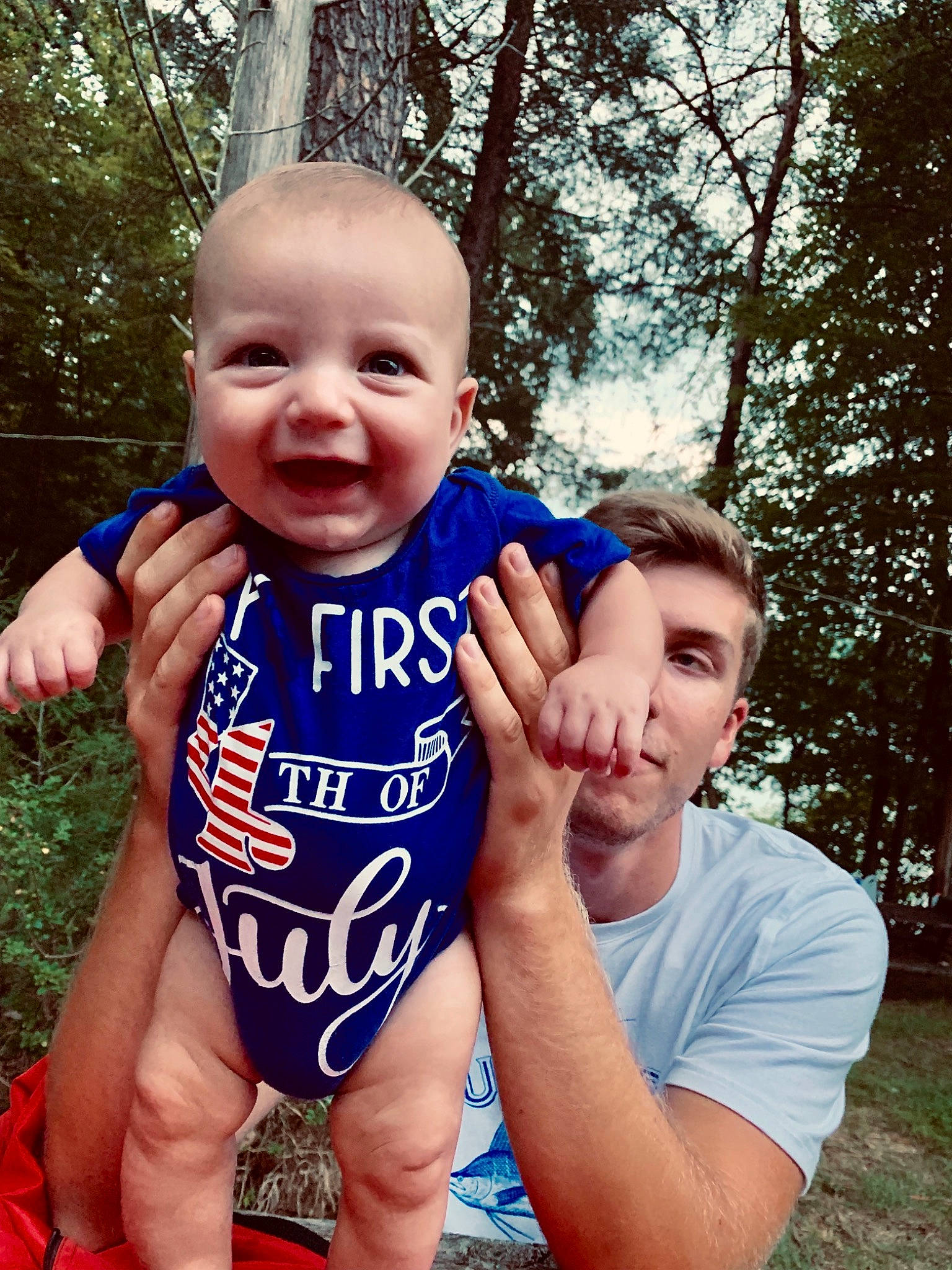 Haiden is registered to the contest to win money with this photo: baby, baby_toddler_clothing, child, cool, father, fun, grass, hand, happy, joy, male, muscle, people, person, photography, plant, smile, summer, t_shirt, toddler