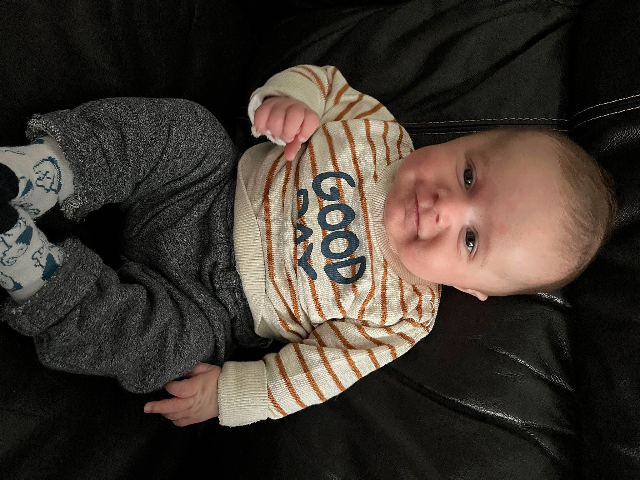 Benjamin participe au concours pour gagner de l'argent avec cette photo : baby, baby_products, baby_toddler_clothing, cheek, child, comfort, eye, eyebrow, headgear, iris, lip, nose, pattern, person, sitting, sleeve, smile, toddler, wood, wool