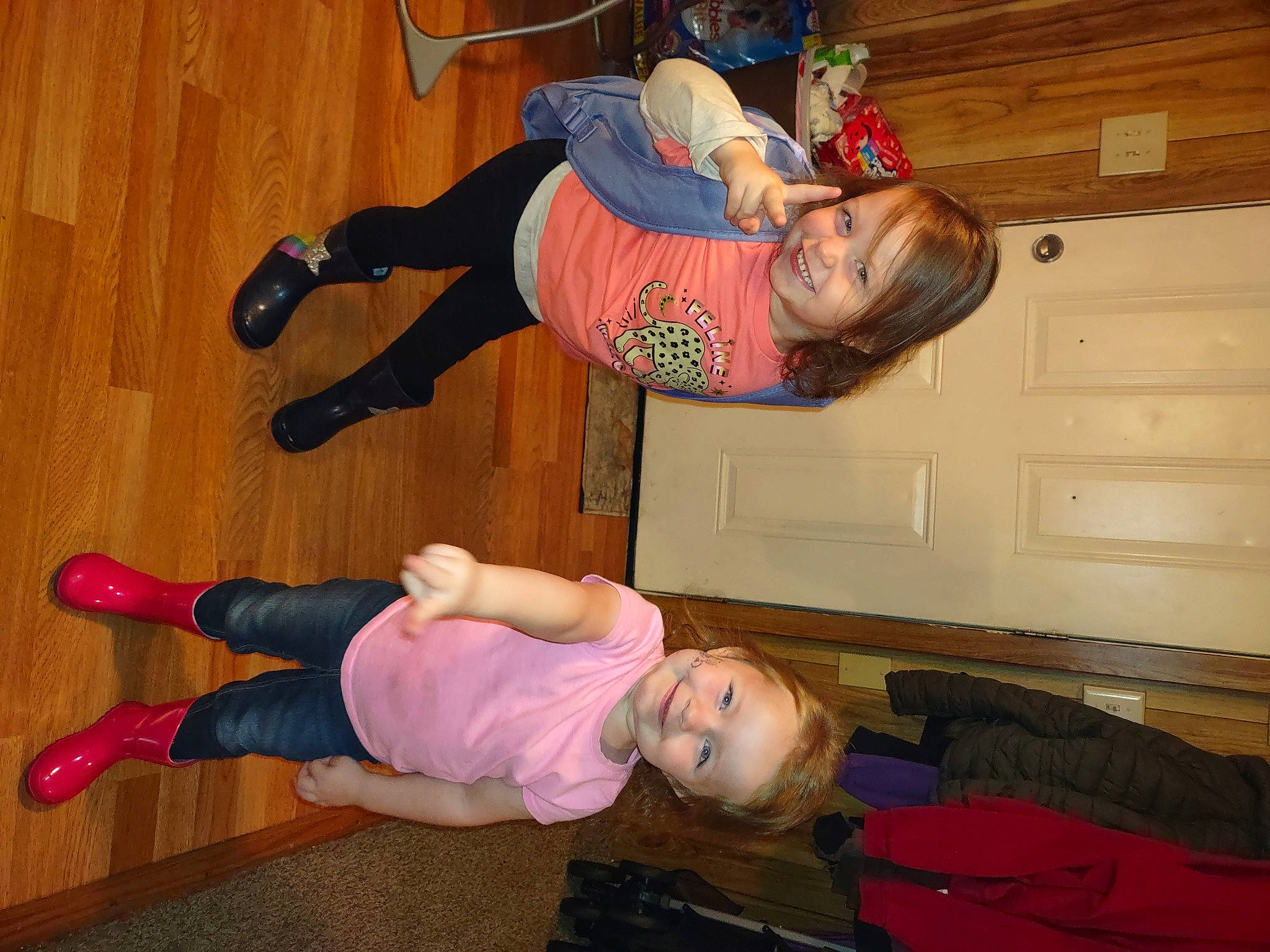 Sophia is registered to the contest to win money with this photo: active_pants, balance, child, comfort, flooring, foot, fun, happy, hardwood, human_leg, joint, joy, knee, leg, person, sock, sportswear, thigh, toddler, walking_shoe