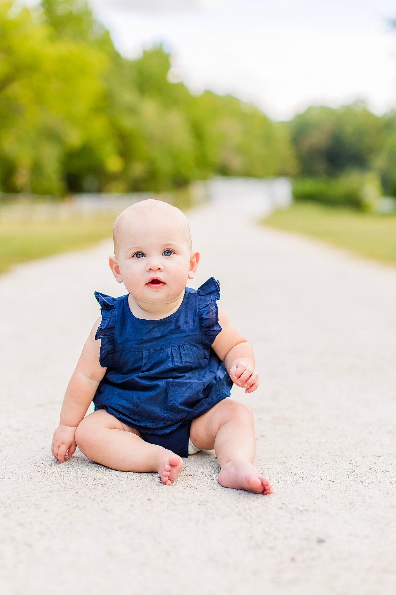 Oaklynn is registered to the contest to win money with this photo: baby, baby_toddler_clothing, child, eye, flash_photography, foot, grass, happy, pattern, people_in_nature, person, photo_shoot, plant, portrait_photography, sitting, sky, sleeve, toddler, tree, vacation