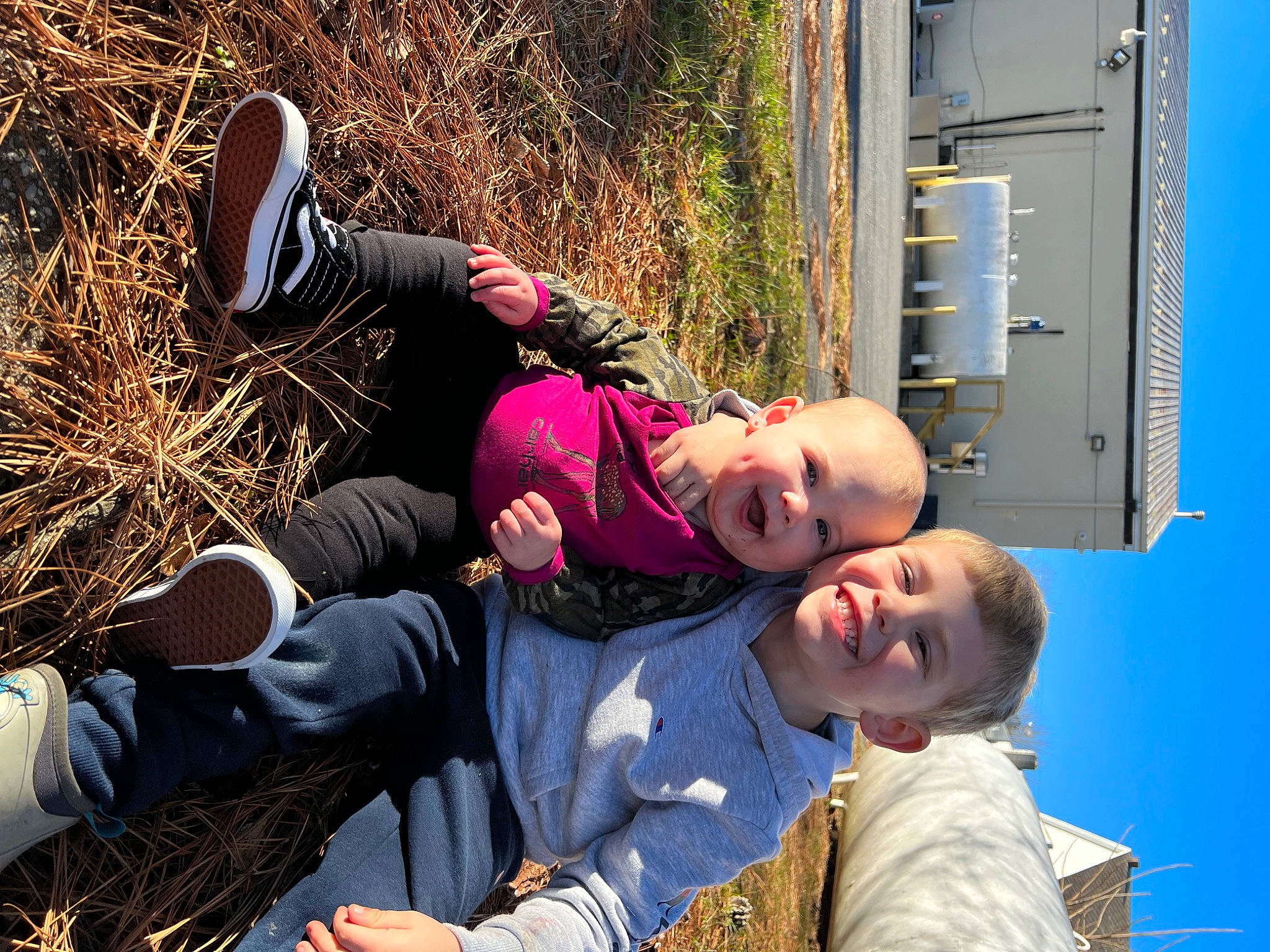 Oaklynn joined the competition — help win amazing prizes! boot, child, eyewear, fun, grass, happy, joy, leisure, machine, person, plant, sitting, sky, toddler, travel, tree, white