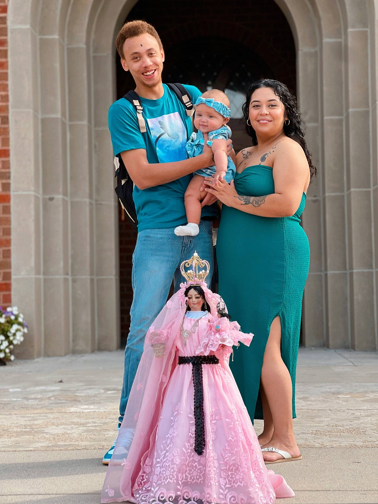 Sky is registered to the contest to win money with this photo: aqua, blue, clothing, day_dress, dress, facial_expression, formal_wear, gown, hair, happy, headwear, interaction, joy, one_piece_garment, outerwear, people, person, pink, shoulder, smile