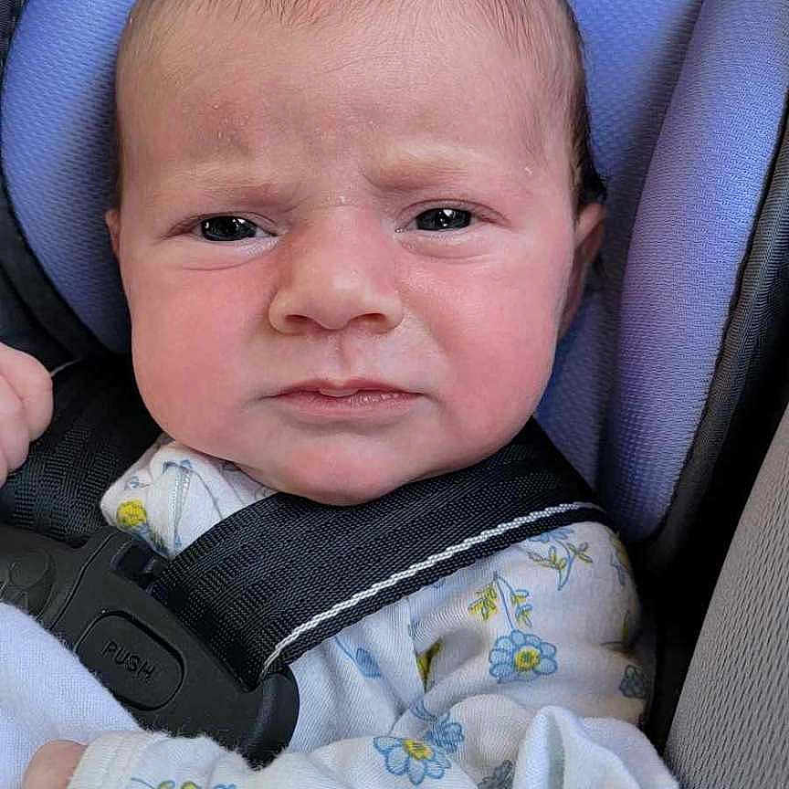 Reba joined the competition — help win amazing prizes! baby, car, car_interior, carseat, clothing, cushion, face, happy, hat, head, headrest, homedecor, newborn, person, photography, portrait, sleeping, smile, transportation, vehicle