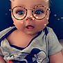 baby, child, filter, bear_ears, glasses, hearts, mickey_mouse, shirt, blue_cushion, cute, infant, face, portrait, expression, indoor, smile, young_child, clothing, person, digital_filter