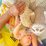 Ember joined the competition — help win amazing prizes! baby, elderly_man, sleeping, blanket, plush_toy, sloth, bed, sleep, family, love, rest, comfort, child, skin, hand, clothing, pillow, colorful, relaxation, indoor