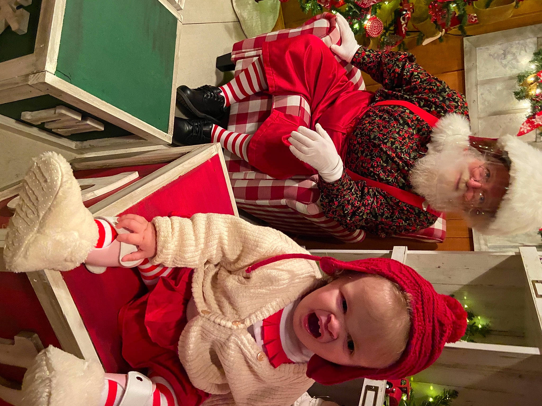 Avè joined the competition — help win amazing prizes! arm, beard, carmine, christmas, christmas_decoration, christmas_eve, christmas_ornament, costume, costume_accessory, costume_hat, fictional_character, holiday, holiday_ornament, interior_design, lap, laugh, mammal, ornament, person, santa_claus