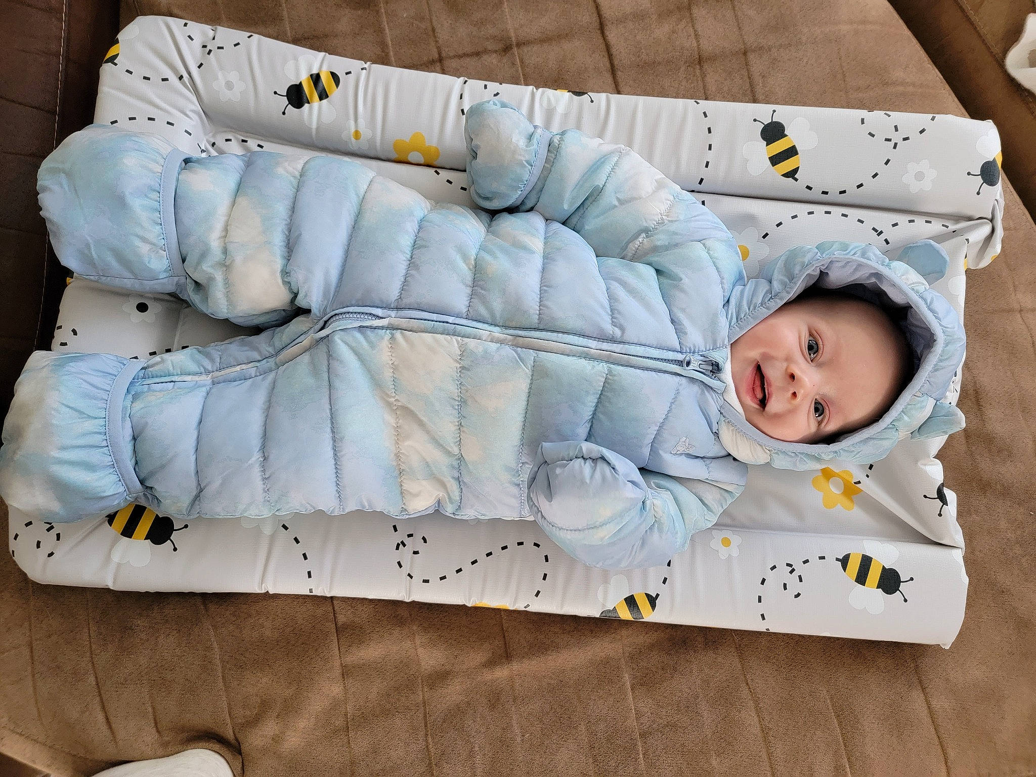 Frank is registered to the contest to win money with this photo: baby, baby_products, baby_toddler_clothing, bedding, child, comfort, couch, flooring, linens, living_room, pattern, person, pillow, rectangle, room, sofa_bed, studio_couch, textile, throw_pillow, toddler