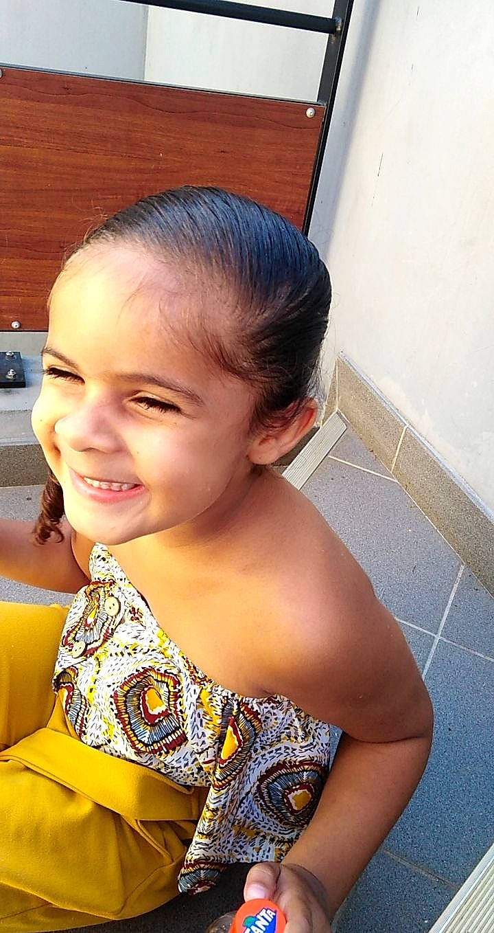 Shaïna a rejoint le concours — aidez-le/la à gagner de superbes lots ! beauty, black_hair, child, chin, dress, ear, face, forehead, hair, hairstyle, happy, joy, long_hair, neck, nose, person, shoulder, skin, smile, toddler