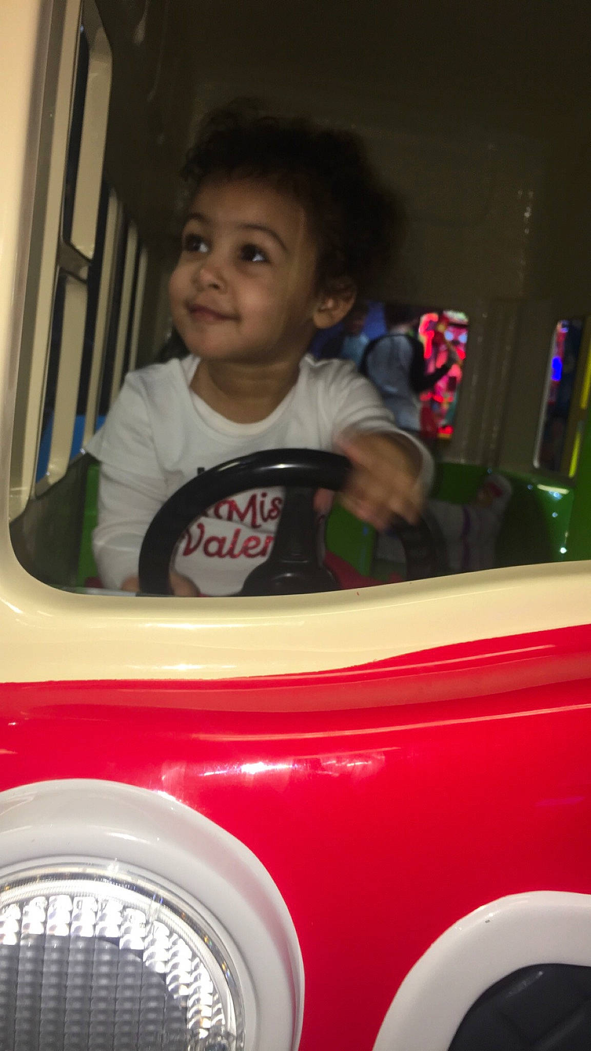 Genevieve joined the competition — help win amazing prizes! automotive_exterior, car, child, fun, person, smile, toddler, vehicle