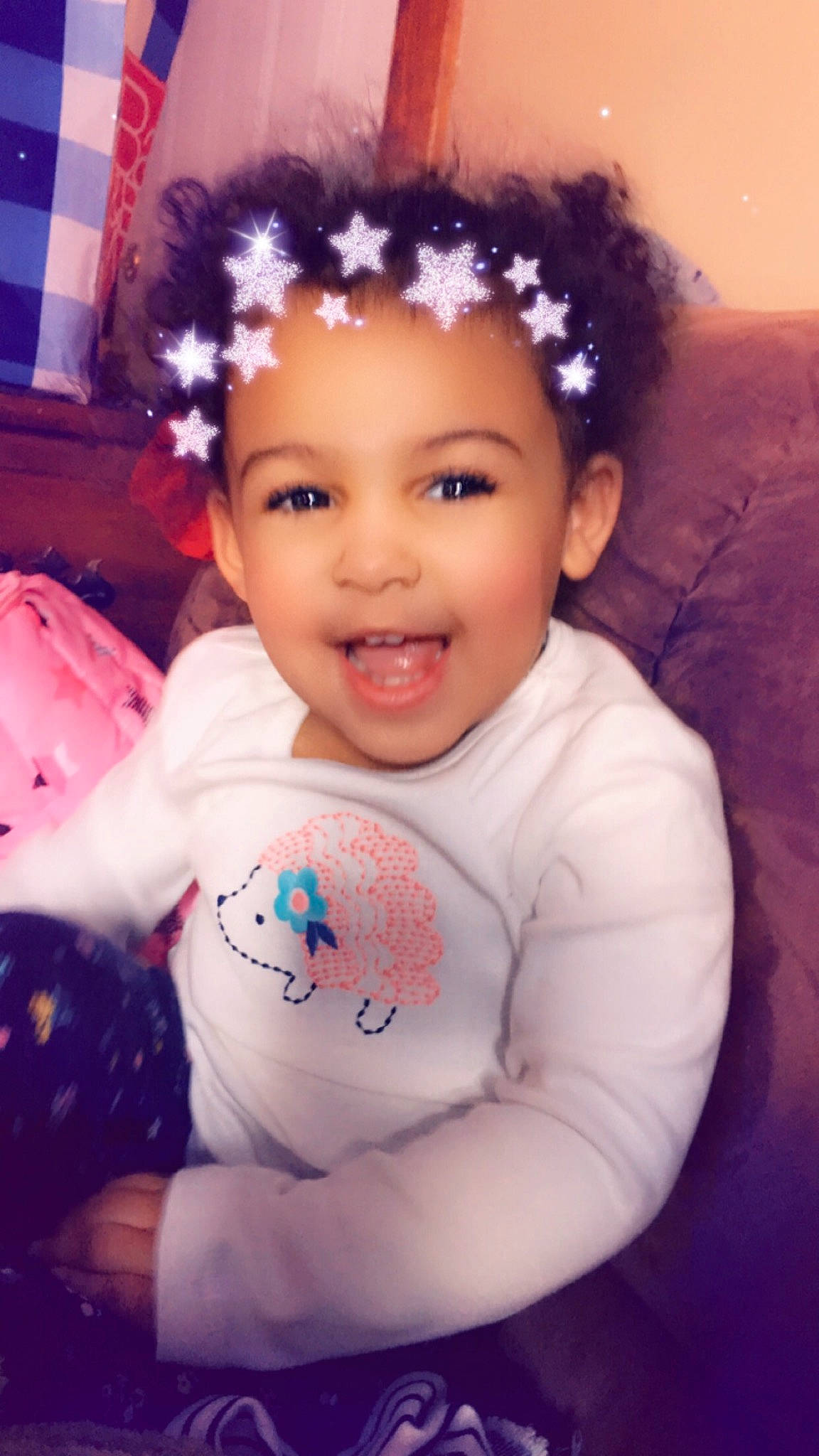 Genevieve is registered to the contest to win money with this photo: baby, beauty, cheek, child, chin, cool, eyebrow, face, facial_expression, forehead, hair, hairstyle, head, headwear, joy, lip, nose, people, person, pink