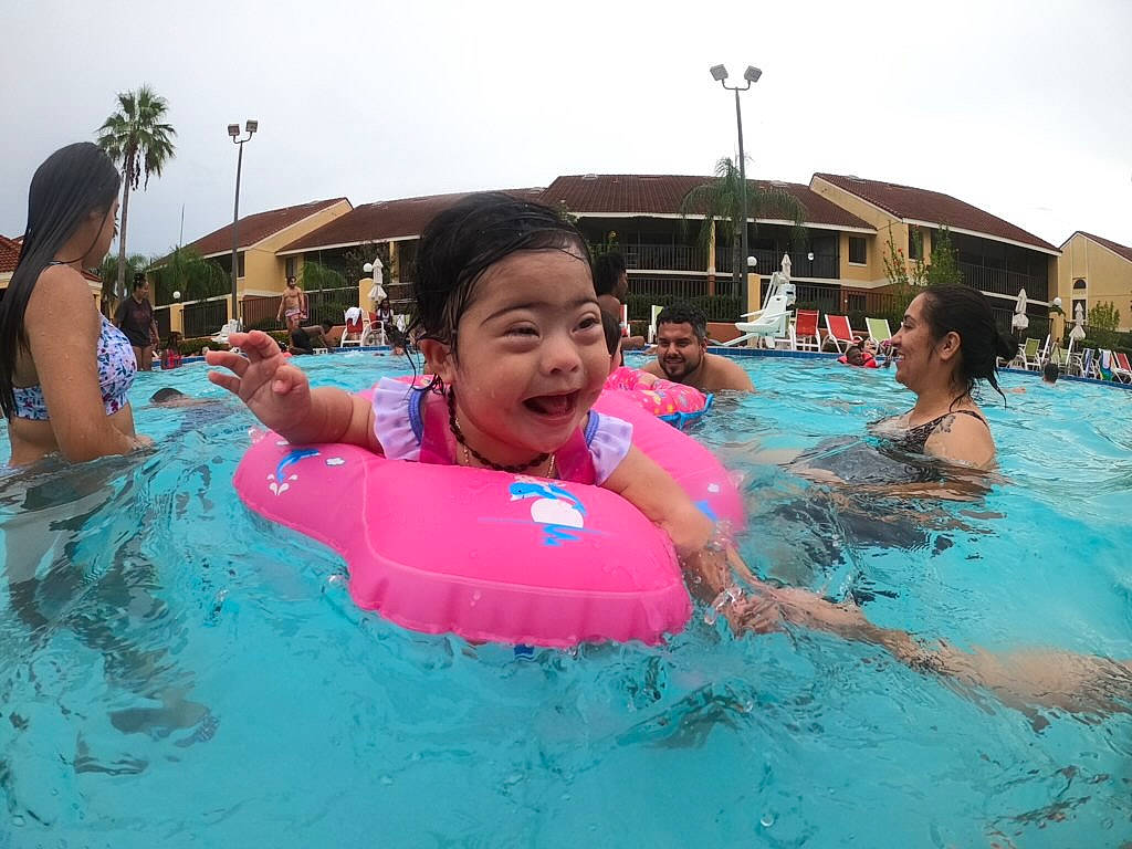 Ofelia joined the competition — help win amazing prizes! baby_float, bathing, building, child, event, face, fun, games, happy, joy, leisure, leisure_centre, outdoor_recreation, person, personal_protective_equipment, recreation, sky, smile, swimming_pool, swimwear