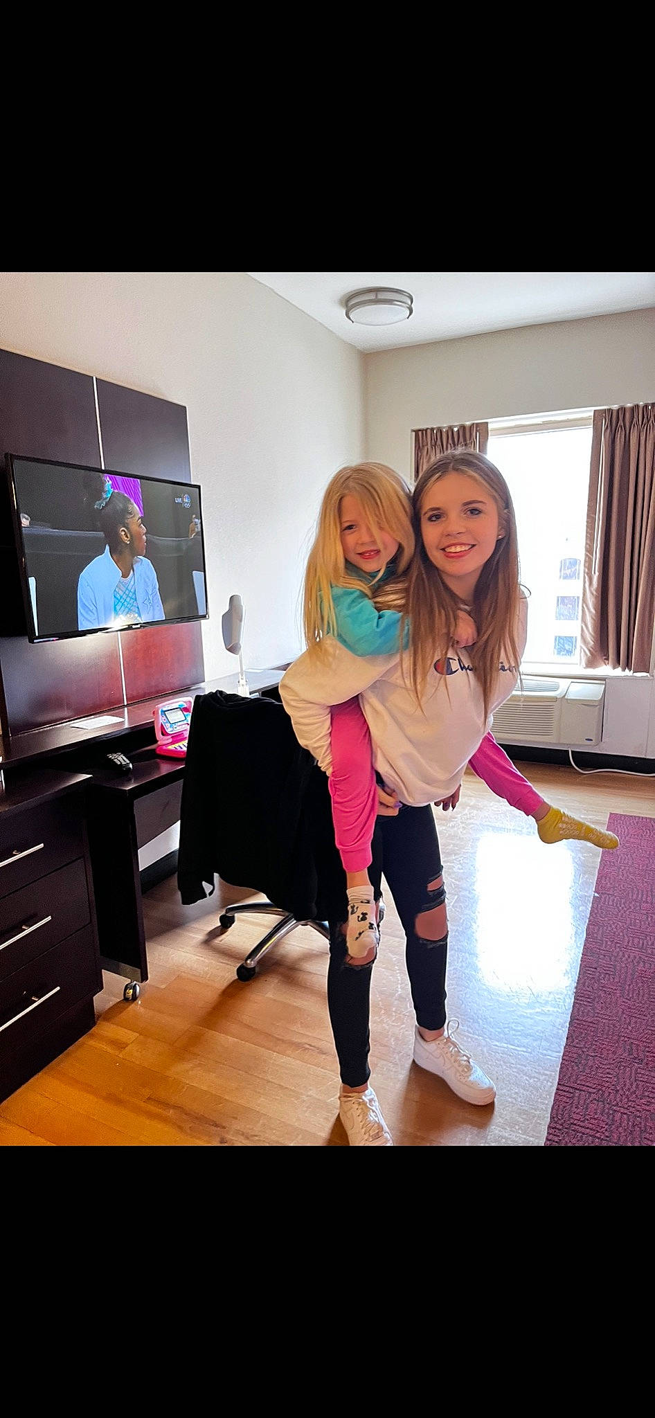 Cali joined the competition — help win amazing prizes! beauty, curtain, entertainment, event, fashion_design, flooring, fun, happy, hardwood, human_leg, interior_design, joy, knee, leisure, magenta, person, selfie, shoulder, smile, sportswear