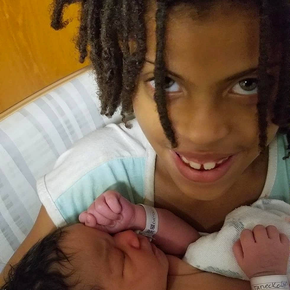 Shaterra is registered to the contest to win money with this photo: beauty, black_hair, cheek, child, eye, eyebrow, face, hair, hand, joy, lip, long_hair, mouth, nose, person, smile