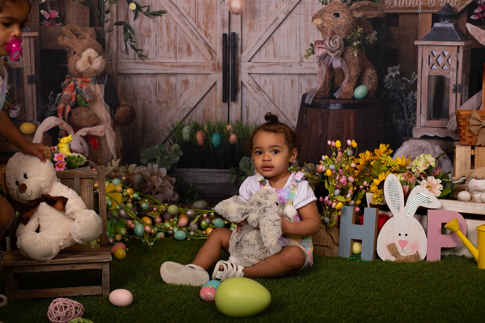 Kehlani is registered to the contest to win money with this photo: child, event, flooring, flower_arranging, fun, grass, green, happy, leisure, mammal, person, photograph, picture_frame, plant, room, sitting, snapshot, stuffed_toy, teddy_bear, toy