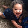 Louie joined the competition — help win amazing prizes! baby, child, crawling, curly_hair, carpet, onesie, smiling, happy, indoor, cute, infant, person, blue, clothing, toddler, playful, skin, hand, face, expression