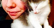 Esther is registered to the contest to win money with this photo: animal, cat, closeup, companion, cozy, cute, domestic, face, feline, fur, happy, indoor, kitten, person, pet, portrait, shoulder, sleeping, smile, young
