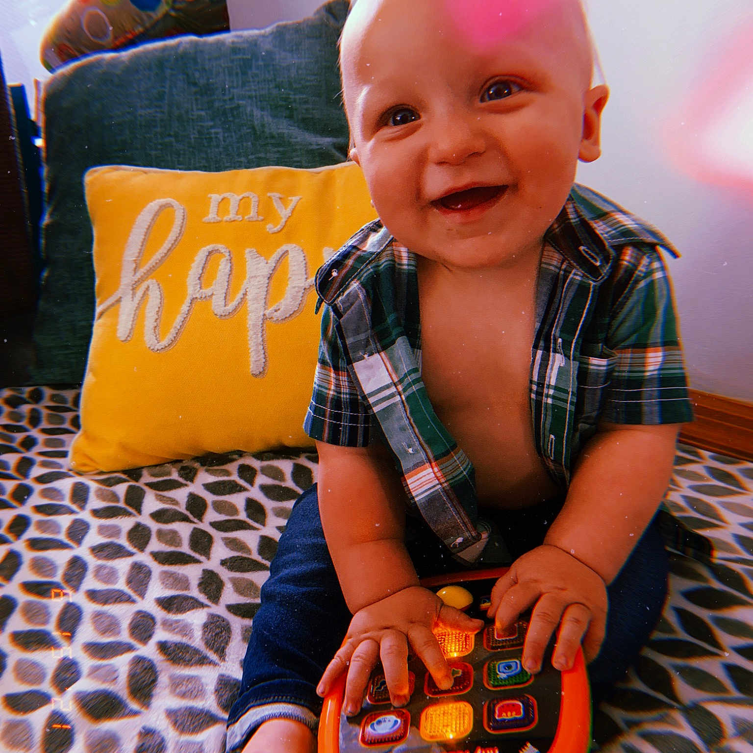 Rhyatt joined the competition — help win amazing prizes! baby, baby_toddler_clothing, calabaza, carmine, child, flooring, fun, happy, musical_instrument, orange, pattern, pillow, play, room, sitting, smile, t_shirt, toddler, toy, vegetable