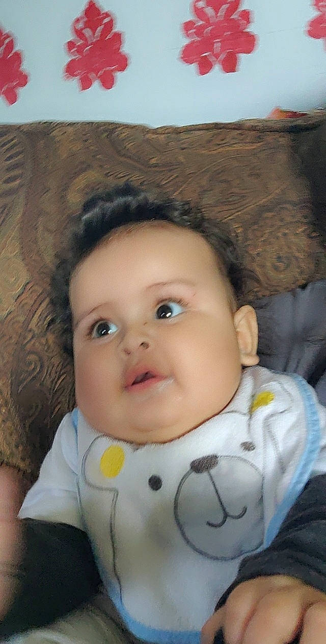 Azrael is registered to the contest to win money with this photo: baby, baby_toddler_clothing, cheek, chin, eye, eyebrow, eyelash, facial_expression, forehead, hair, head, human_body, iris, lip, mouth, neck, nose, person, skin, sleeve