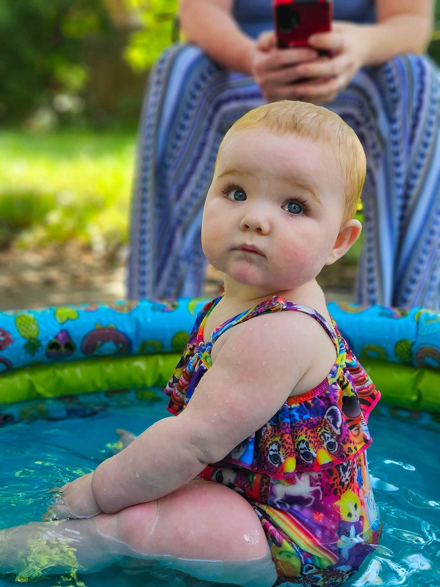 Violet joined the competition — help win amazing prizes! baby, baby_toddler_clothing, blue, child, electric_blue, event, facial_expression, fun, grass, happy, leisure, nonbuilding_structure, person, photograph, recreation, sitting, skin, summer, toddler, vacation