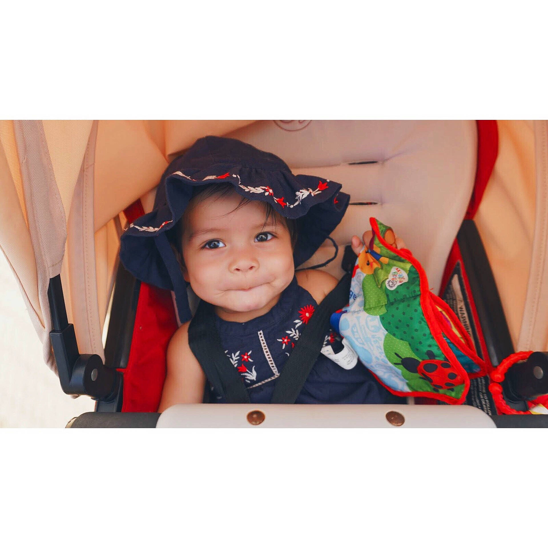 Juliette is registered to the contest to win money with this photo: child, ear, hair_accessory, headgear, person, picture_frame, product, toddler