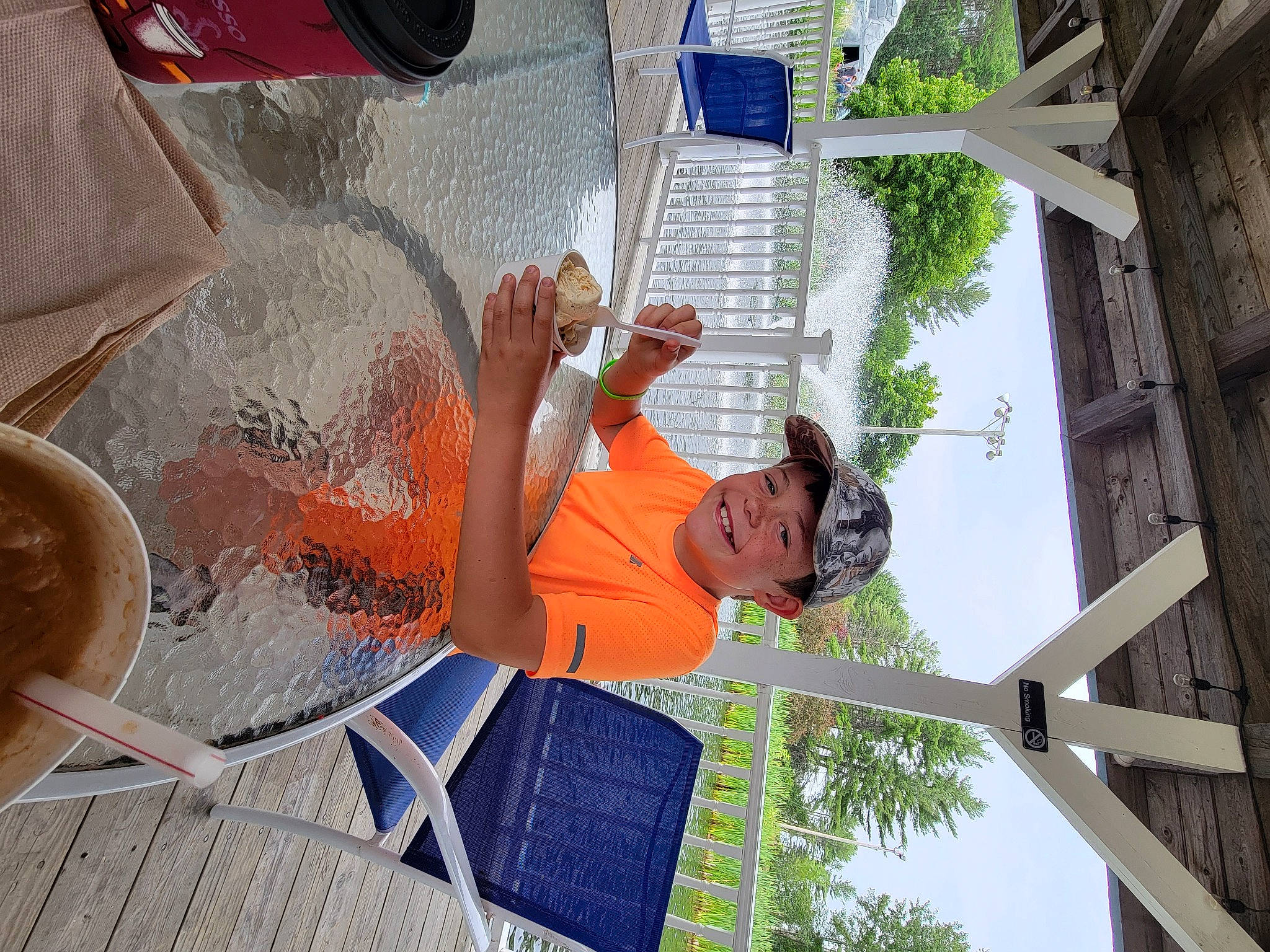 Jaxsyn joined the competition — help win amazing prizes! daytime, eyewear, facade, fun, headwear, joy, leisure, person, shorts, sky, smile, t_shirt, tree, vacation, visual_arts, water, wood