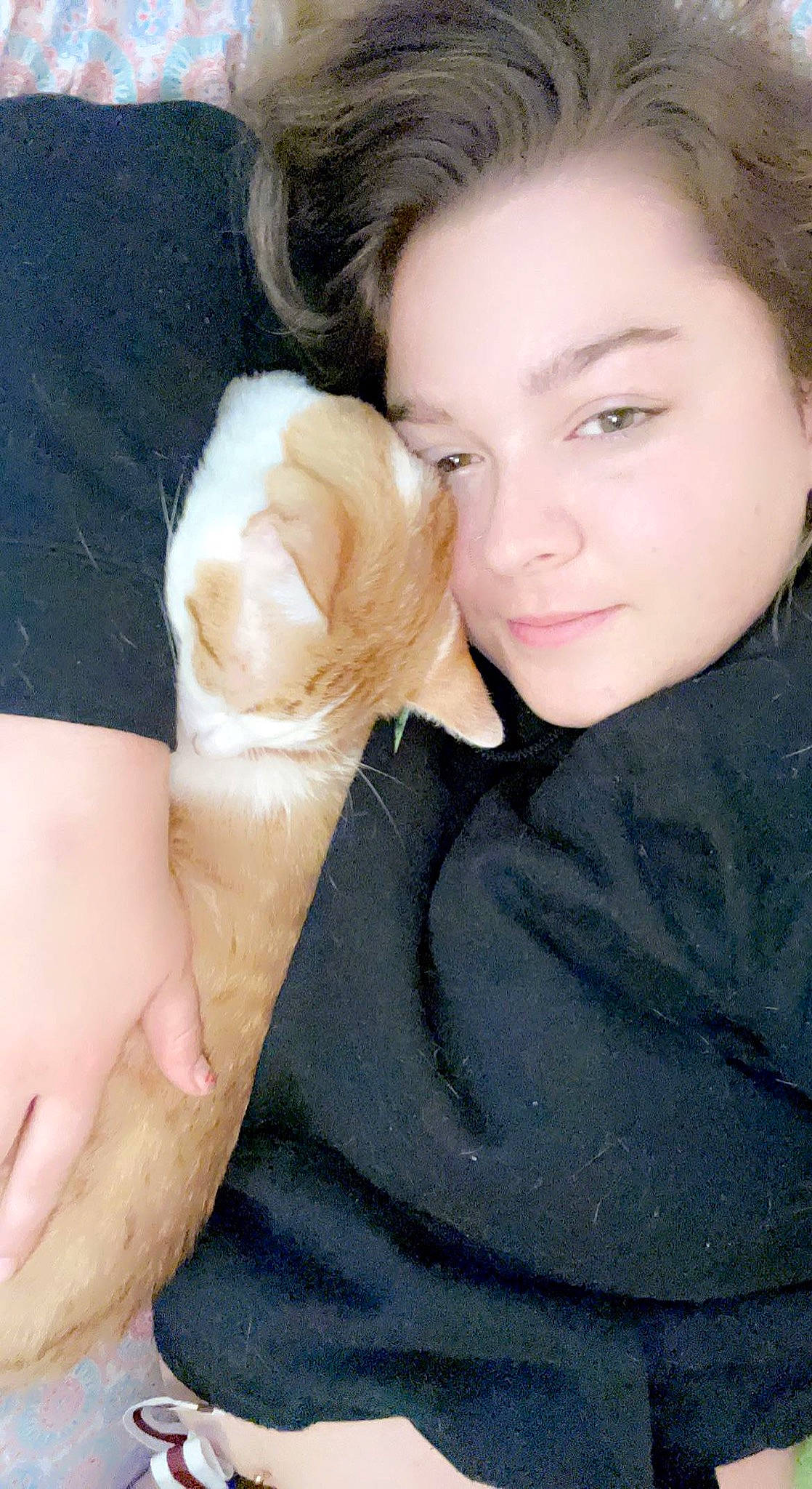 Ronald is registered to the contest to win money with this photo: black_hair, companion_dog, dress, eye, eyebrow, eyelash, finger, gesture, grass, hair, hand, happy, jaw, lip, long_hair, nail, neck, nose, thumb, toy