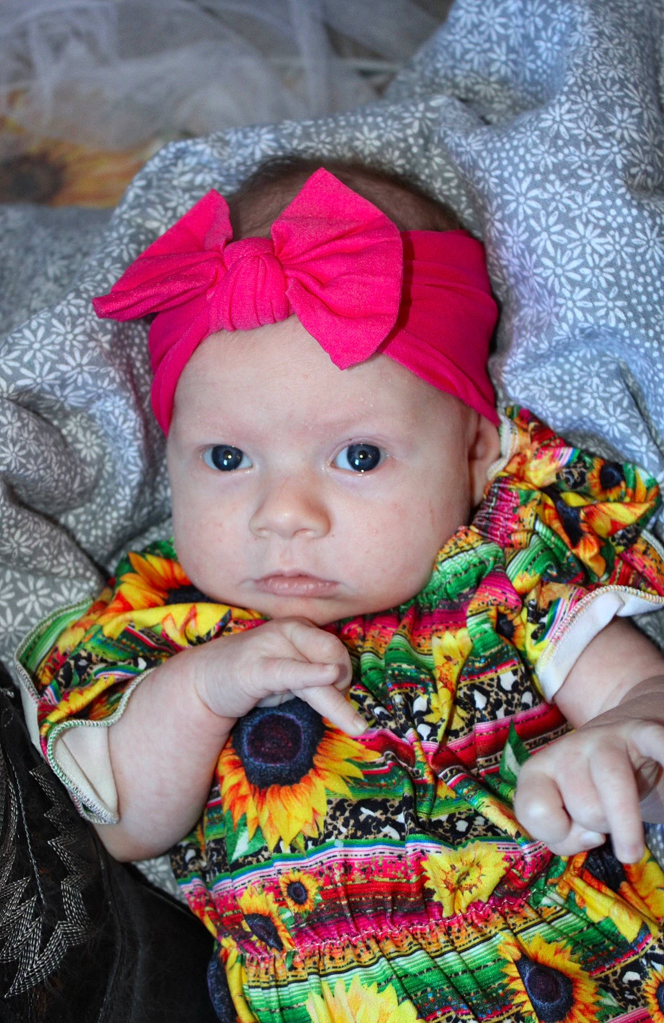 Tatum joined the competition — help win amazing prizes! baby, baby_toddler_clothing, cap, cheek, child, chin, dress, eye, face, grass, head, headwear, iris, lip, orange, pattern, person, pink, skin, sleeve