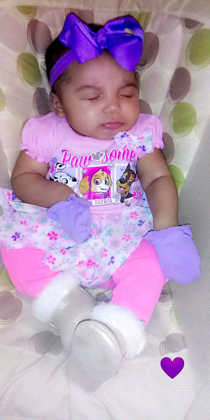 A'Vi is registered to the contest to win money with this photo: baby, baby_products, baby_toddler_clothing, child, hair_accessory, headband, headgear, person, pink, product, smile, toddler