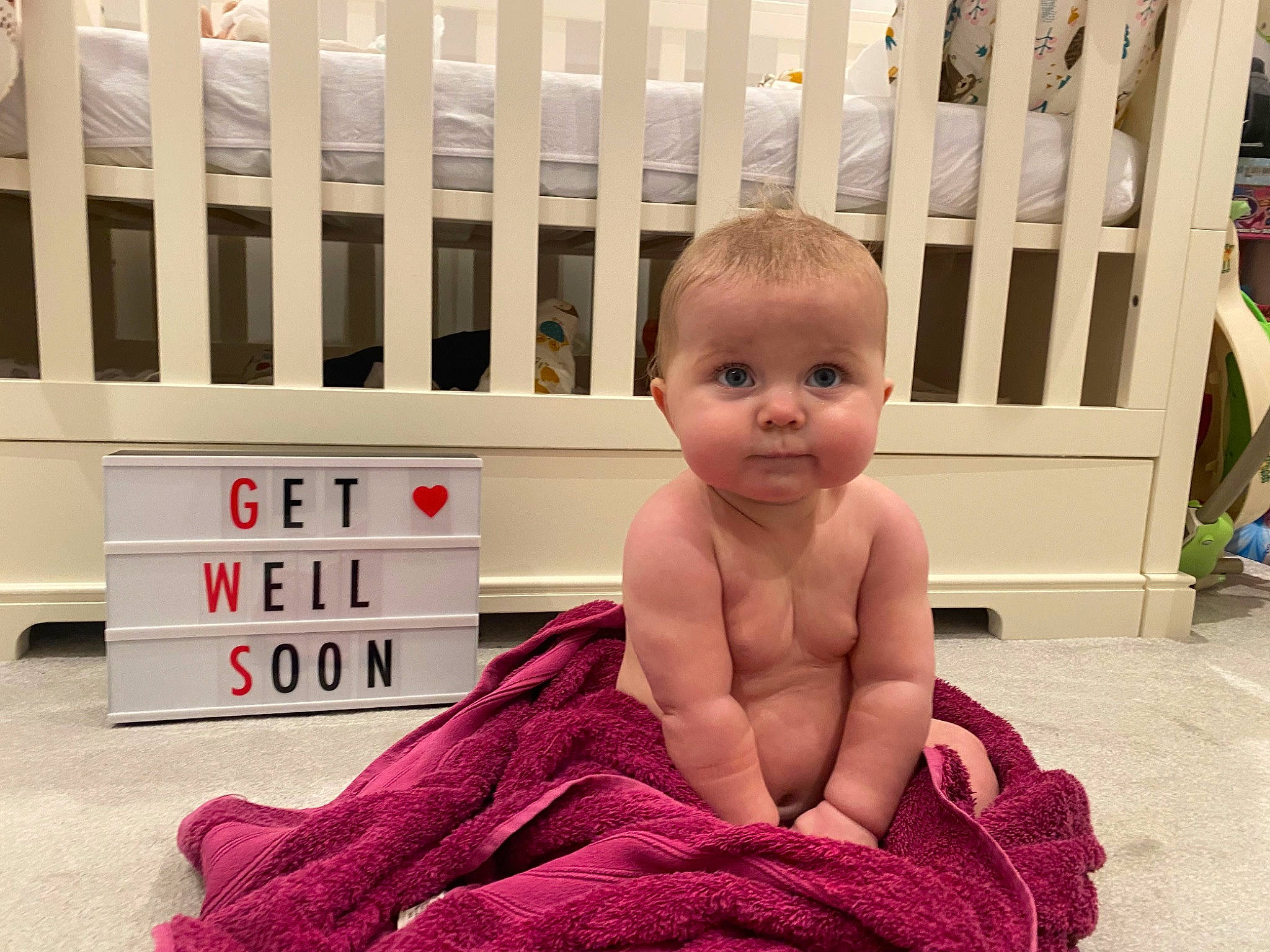 Margot joined the competition — help win amazing prizes! baby, baby_toddler_clothing, child, comfort, facial_expression, fence, floor, flooring, happy, hardwood, leg, mammal, person, photograph, pink, product, smile, snapshot, thumb, toddler