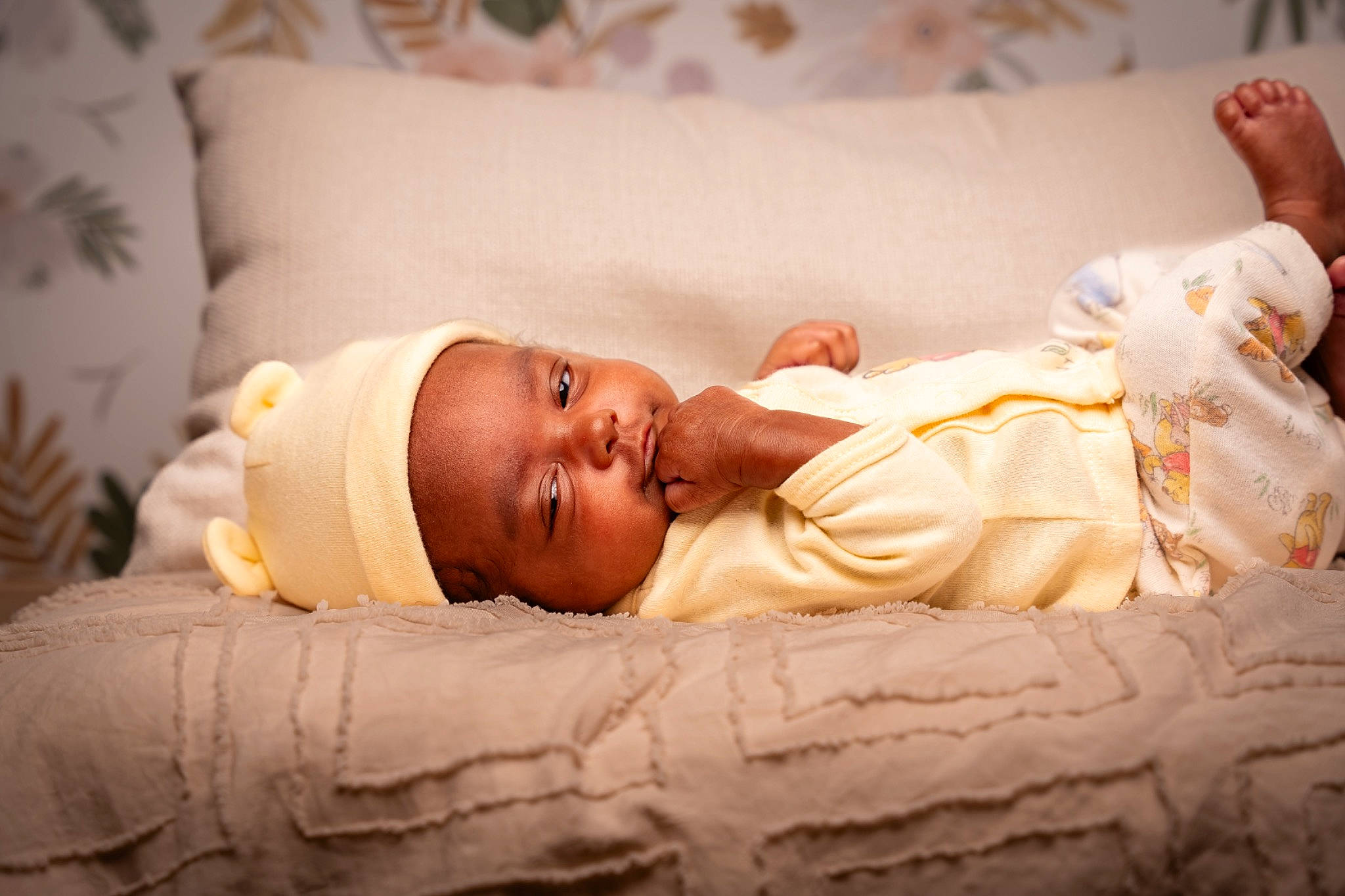 Baylee is registered to the contest to win money with this photo: arm, baby, baby_sleeping, baby_toddler_clothing, bedding, bedtime, child, comfort, event, eye, flash_photography, hand, hat, head, headgear, linens, person, room, skin, sleep