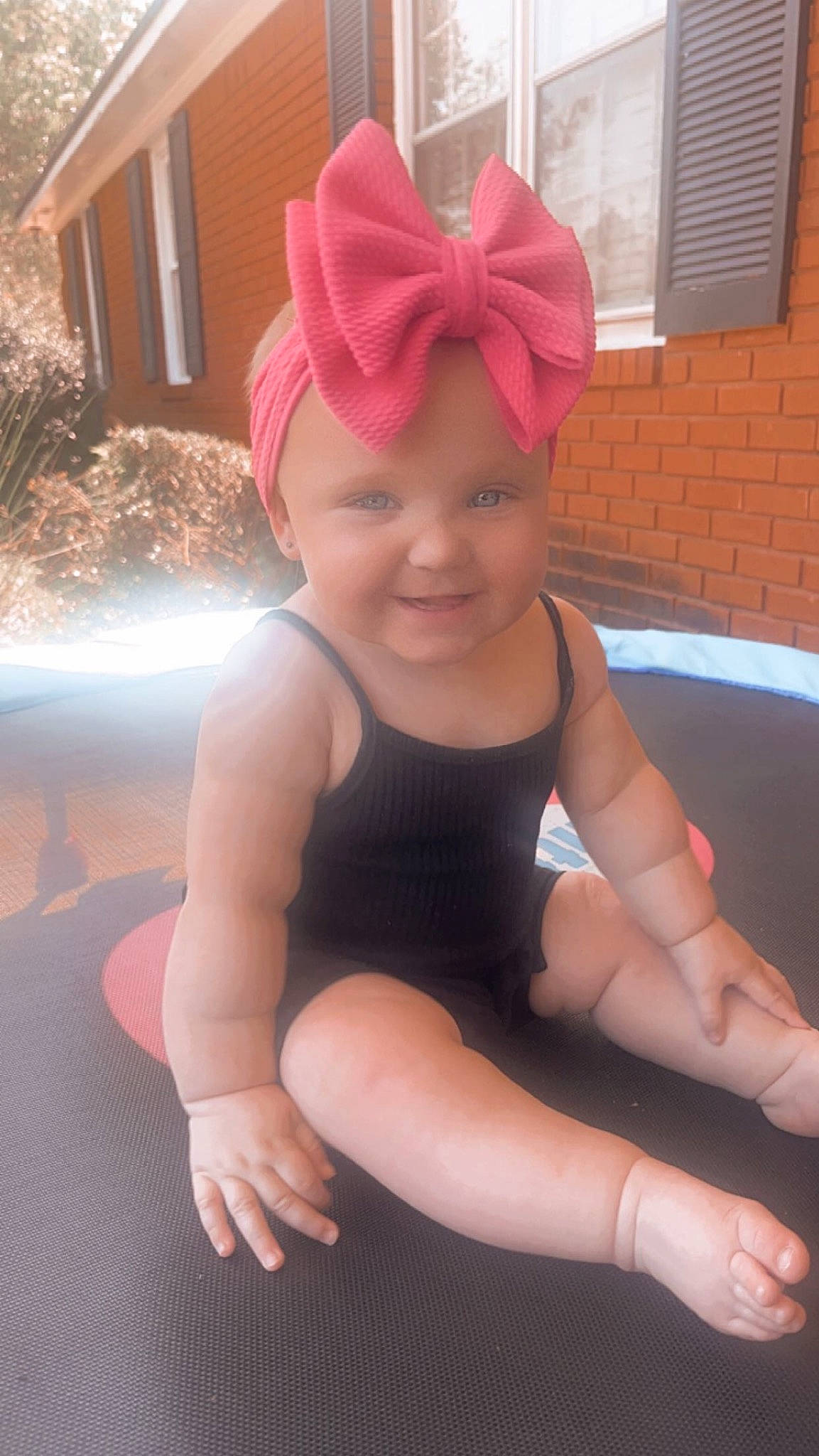 Brylee joined the competition — help win amazing prizes! baby_toddler_clothing, cap, child, costume_hat, face, fun, happy, hat, head, headgear, headpiece, headwear, helmet, human_body, joy, magenta, person, pink, smile, thigh